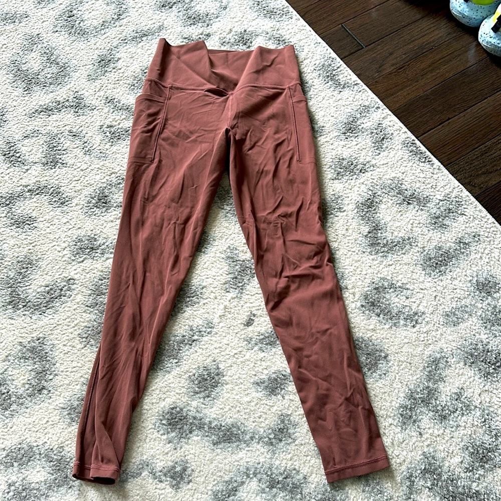 Athleta, Salutation Stash Pocket II tight, Size small, clay red